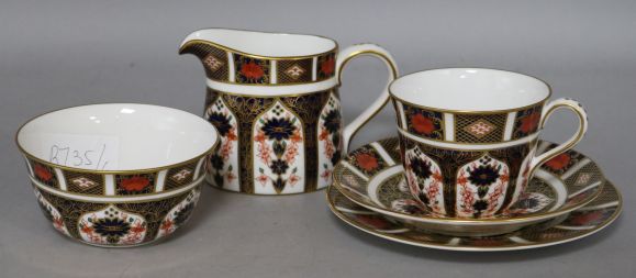 A Royal Crown Derby tea set for four