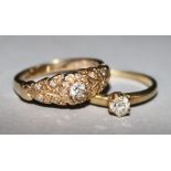 A gold and solitaire diamond ring and a 14ct gold and diamond ring.