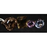 Four 9ct and gem set rings.
