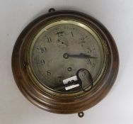 An oak cased wall clock