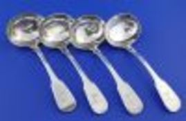 A set of four George IV provincial silver fiddle pattern sauce ladles by John Walton, with