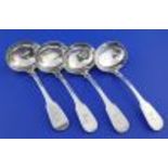 A set of four George IV provincial silver fiddle pattern sauce ladles by John Walton, with