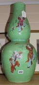 A large 19th century Chinese green ground double gourd 'phoenix' vase, H 57.5cm (restored)