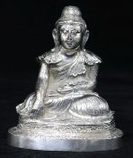 An Indian silver model of Buddha, height 5in.