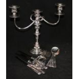 Silver plated cutlery and a two branch candelabra