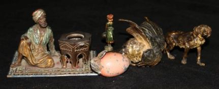 An Austrian cold-painted bronze model of a songbird and four similar items