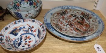 An 18th century Chinese blue and white dish, 34cm and two Imari bowls and a dish, 19.5-27cm (4,