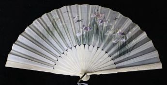 A Japanese ivory and embroidered silk fan