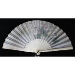 A Japanese ivory and embroidered silk fan