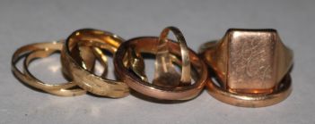 A 9ct gold signet ring and and eight other assorted rings.