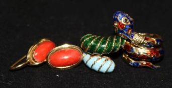 A pair of 18ct gold and coral earrings and two enamelled rings.