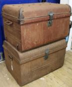 Two metal travelling trunks