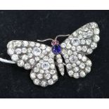 An early 20th century silver and paste set butterfly brooch, 1.75in.