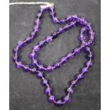A single strand amethyst bead necklace, 26in.