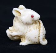 A Japanese ivory rat netsuke