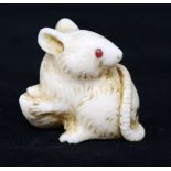 A Japanese ivory rat netsuke