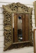 A Flemish gilt carved oak mirror, H.90cm