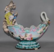 A Continental porcelain figural swan centrepiece