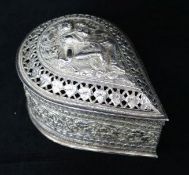 A Burmese silver teardrop shaped box with pierced cover containing minor items of jewellery.