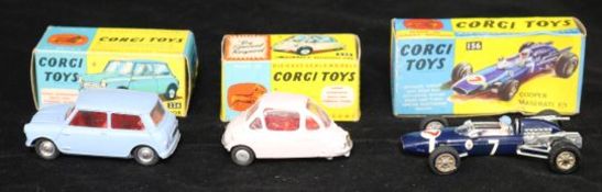A Corgi 156 Cooper Maserati, a Corgi 238 Economy car and a Corgi 226 Mini Minol