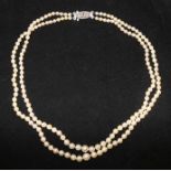 A double strand cultured pearl necklace with marcasite set clasp, 16in.