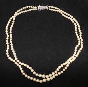 A double strand cultured pearl necklace with marcasite set clasp, 16in.