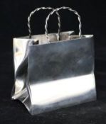 A Cartier sterling silver model of a handbag, 4in.