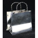 A Cartier sterling silver model of a handbag, 4in.