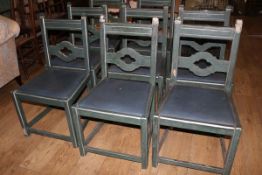 A set of eight green painted hardwood dining chairs, with drop in seats