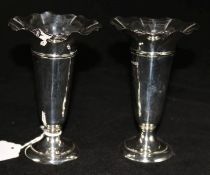 A pair of George V silver posy vases, 5.5in.