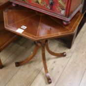 A Regency style burr yew banded octagonal topped occasional table, W.56cm