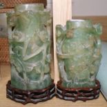 Two Chinese carvings on stands and a pot