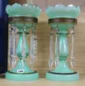 A pair of green glass lustres