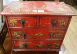 A miniature Chinese red lacquer cabinet, W.51cm