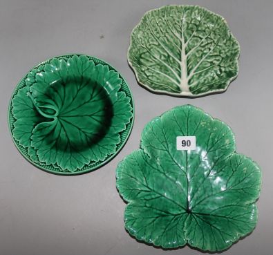 A collection of green leaf plates and dishes