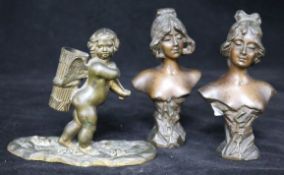 A pair of small bronze busts: Ayda and Leda and a putto match tidy