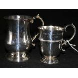 A late Victorian silver christening cup and a later silver mug.