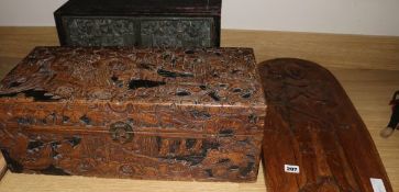 An oak carving, cupboard with embossed knight doors and Chinese box