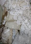 A collection of lace trimmings and hankies etc