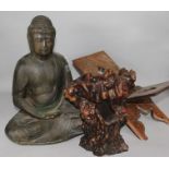 A Chinese rootwood vase, a carved Buddha and a Koran stand (3)