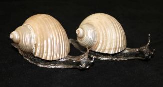 A pair of WMF plated snails with lustre shells (one horn a.f)