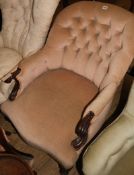 A button back scrolled arm chair