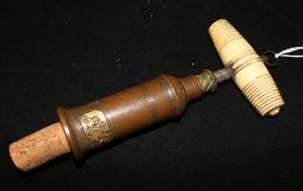 An ivory handle corkscrew