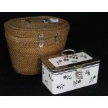 A Chinese teapot in wicker case and a ceramic sandwich box