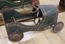 A tinplate toy car (a.f.)