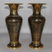 A pair of large Benares brass vases