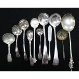 A George II silver apostle spoon (marks rubbed) and a collection of small silver sauce ladles,