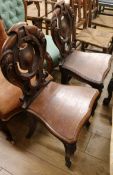 A pair of hall chairs