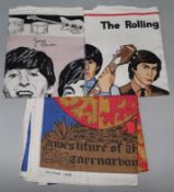 Three 1960's colour printed tea towels, The Beatles, Rolling Stones and Prince of Wales Investiture,