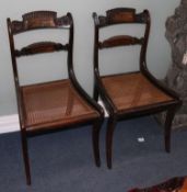 A set of six Regency brass inset simulated rosewood dining chairs